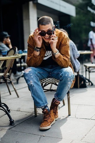 Navy Ripped Jeans Outfits For Men: Reach for a tobacco suede shirt jacket and navy ripped jeans for a edgy and casual and trendy outfit. Why not add a pair of tobacco suede high top sneakers to your outfit for a more relaxed aesthetic?
