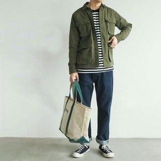Beige Print Canvas Tote Bag Outfits For Men: If you're looking for an off-duty but also stylish getup, try teaming an olive shirt jacket with a beige print canvas tote bag. Feel uninspired with this look? Invite a pair of navy and white canvas low top sneakers to jazz things up.