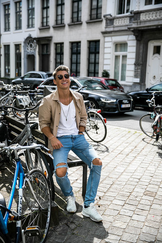 Beige Shirt Jacket Outfits For Men: For a laid-back ensemble, try pairing a beige shirt jacket with light blue ripped jeans — these two pieces go well together. Wondering how to finish? Complement your look with white athletic shoes for a more casual finish.
