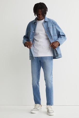 Light Blue Jeans Outfits For Men: A light blue denim shirt jacket and light blue jeans are an easy way to inject effortless cool into your current collection. To add a little edge to your outfit, complete your ensemble with white leather low top sneakers.