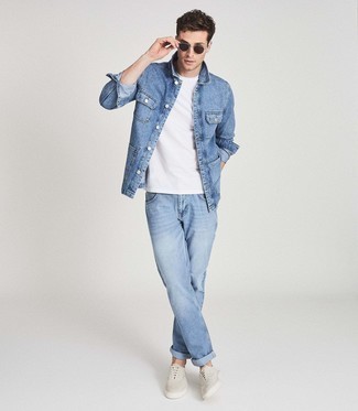 Navy Denim Shirt Jacket Outfits For Men: Demonstrate that you do casual like no-one else by opting for a navy denim shirt jacket and light blue jeans. Grey canvas low top sneakers will add a mellow feel to this ensemble.