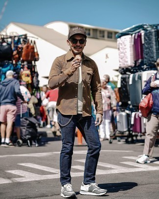 Brown Shirt Jacket Outfits For Men: To pull together a casual look with a contemporary spin, choose a brown shirt jacket and navy jeans. To introduce a laid-back vibe to your look, add grey athletic shoes to the mix.