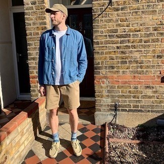 Shorts Outfits For Men: This combo of a blue chambray shirt jacket and shorts resonates comfort and effortless menswear style. If in doubt about the footwear, go with a pair of beige suede desert boots.