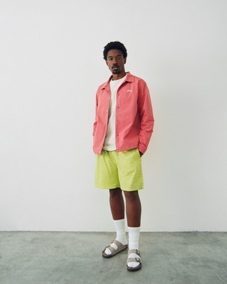 Tan Suede Sandals Outfits For Men: Indisputable proof that a hot pink shirt jacket and green-yellow print shorts are amazing when paired together in a casual ensemble. For a more laid-back feel, complete your outfit with a pair of tan suede sandals.