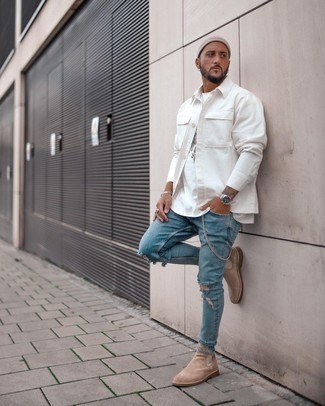 Blue Ripped Skinny Jeans Outfits For Men: This combo of a white shirt jacket and blue ripped skinny jeans combines comfort and utility and helps you keep it simple yet contemporary. Complement this outfit with tan suede chelsea boots to instantly jazz up the look.