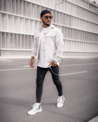 White Shirt Jacket Outfits For Men: This on-trend outfit is so simple: a white shirt jacket and charcoal skinny jeans. Add a carefree feel to your outfit by wearing a pair of grey print canvas high top sneakers.