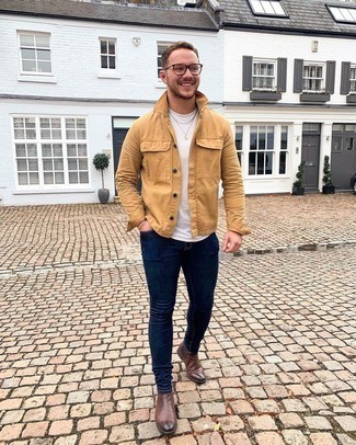 Navy Skinny Jeans Smart Casual Outfits For Men: To create a relaxed casual look with a modern spin, you can easily dress in a tan shirt jacket and navy skinny jeans. Go for brown leather chelsea boots to immediately ramp up the classy factor of this ensemble.