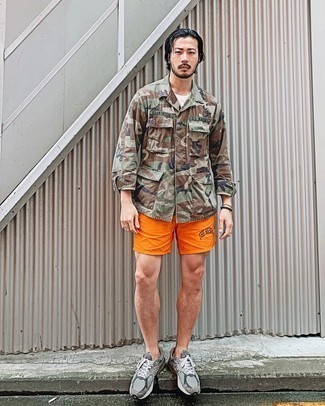 Yellow Shorts Outfits For Men: For a casual ensemble with an edgy take, you can rock an olive camouflage shirt jacket and yellow shorts. Grey athletic shoes will bring a fun vibe to this look.