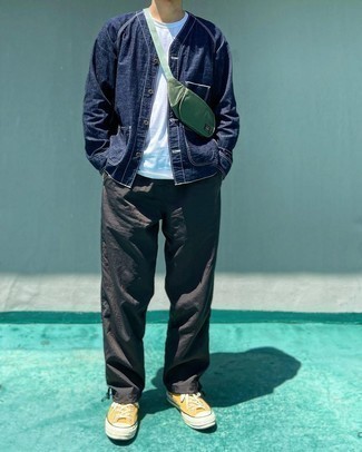 Yellow Low Top Sneakers Outfits For Men: Reach for a navy denim shirt jacket and charcoal sweatpants for a casual ensemble with a contemporary spin. If not sure as to the footwear, complete your outfit with a pair of yellow low top sneakers.