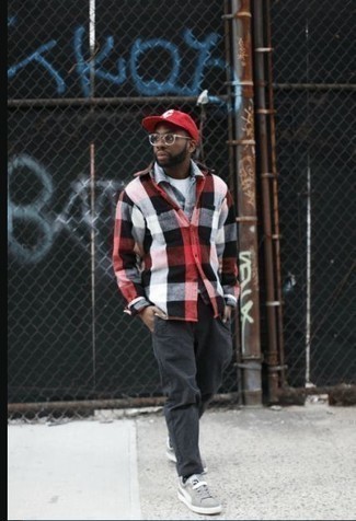 Red and Black Check Flannel Shirt Jacket Outfits For Men: For an outfit that brings function and dapperness, team a red and black check flannel shirt jacket with charcoal chinos. To infuse a more relaxed touch into your look, add a pair of grey canvas low top sneakers to your look.