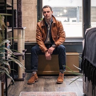 Brown Suede Desert Boots Outfits: A brown leather shirt jacket and navy jeans will bring extra style to your daily casual repertoire. Throw a pair of brown suede desert boots into the mix and the whole ensemble will come together.