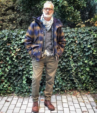 Multi colored Print Scarf Outfits For Men: Rock a navy plaid wool shirt jacket with a multi colored print scarf for an easy-to-create ensemble. To give this outfit a sleeker finish, complete this outfit with brown leather casual boots.