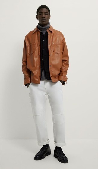 Black Leather Desert Boots Outfits: This combination of a tobacco leather shirt jacket and white chinos is surely impactful, but it's also very easy to wear. On the footwear front, this look is finished off perfectly with black leather desert boots.