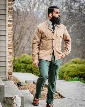 Dark Green Dress Pants Outfits For Men: To look like a real dandy with a good deal of style, team a tan shirt jacket with dark green dress pants. Our favorite of a multitude of ways to finish off this ensemble is a pair of dark brown leather derby shoes.