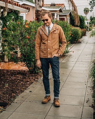 Dark Brown Suede Casual Boots Outfits For Men: A tan shirt jacket and navy jeans are the kind of a never-failing casual look that you need when you have no extra time. Complement this ensemble with dark brown suede casual boots and ta-da: the outfit is complete.