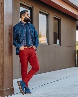 Red Jeans Outfits For Men: Fashionable and practical, this relaxed casual combo of a navy denim shirt jacket and red jeans provides with countless styling opportunities. Look at how nice this outfit is completed with a pair of navy suede desert boots.