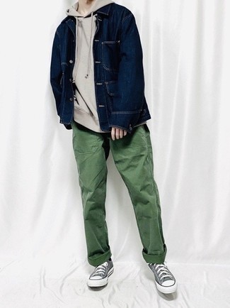 Grey Canvas Low Top Sneakers Outfits For Men: Go for a simple yet refined choice combining a navy denim shirt jacket and dark green chinos. To introduce a fun feel to your outfit, introduce grey canvas low top sneakers to the mix.