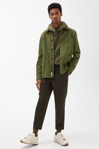 Dark Brown Chinos Outfits: An olive shirt jacket and dark brown chinos are essential in any gent's versatile closet. White athletic shoes will effortlessly tone down a classic look.