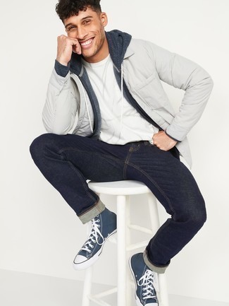 Navy Hoodie Outfits For Men: A navy hoodie and navy jeans are among those game-changing menswear pieces that can revolutionize your closet. Our favorite of an endless number of ways to complement this look is a pair of navy and white canvas high top sneakers.