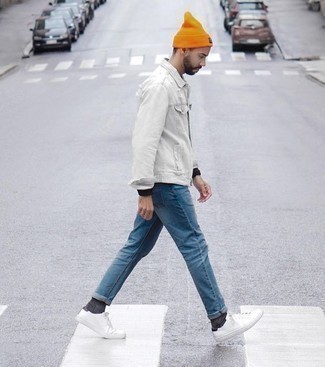 Yellow Beanie Outfits For Men: This contemporary combination of a white denim shirt jacket and a yellow beanie is capable of taking on different moods according to the way you style it. Add a pair of white canvas low top sneakers to the equation to instantly change up the outfit.
