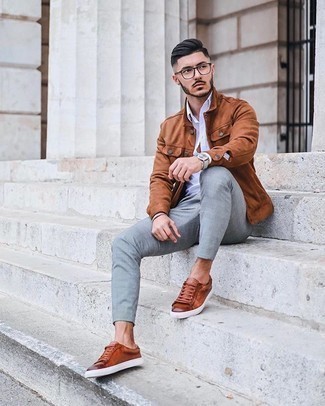 Tobacco Suede Shirt Jacket Outfits For Men: Showcase that you do classic and casual menswear like no-one else in a tobacco suede shirt jacket and grey chinos. When this outfit is just too much, dial it down by slipping into tobacco leather low top sneakers.