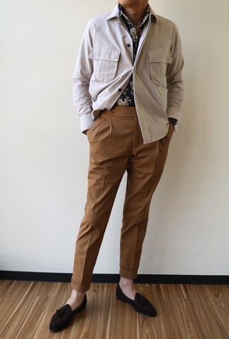 Dark Brown Suede Tassel Loafers Outfits: This combination of a beige shirt jacket and tobacco chinos is a must-try casually sleek look for any modern guy. To add a bit of classiness to your look, complement your outfit with a pair of dark brown suede tassel loafers.