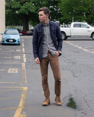 Brown Chinos with Navy Shirt Jacket Fall Outfits: A navy shirt jacket and brown chinos make for the ultimate effortlessly smart getup. This look is completed wonderfully with a pair of tan leather casual boots. This combination is a nice idea if you're planning a well-coordinated look for transitional weather.