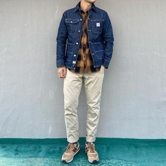 Beige Chinos Fall Outfits: For an ensemble that's nothing less than GQ-worthy, pair a navy denim shirt jacket with beige chinos. Introduce a pair of tan athletic shoes to the equation to spice things up. Keep the autumn anxiety at bay in a stylish ensemble like this one.