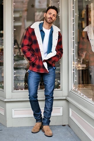 Red Check Flannel Shirt Jacket Outfits For Men: To put together a casual outfit with a contemporary spin, marry a red check flannel shirt jacket with navy jeans. Serve a little outfit-mixing magic by finishing with tan suede chelsea boots.