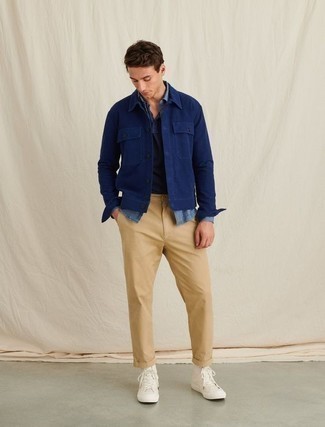 1200+ Outfits For Men In Their 30s: Choose a navy shirt jacket and khaki chinos and you'll don a neat and polished ensemble. For something more on the daring side to complement your look, add a pair of white canvas high top sneakers to the mix. Ideal if you're on a mission for some incredibly inspiring off-duty style for young guys.