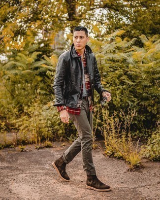 Black Leather Shirt Jacket Outfits For Men: Go for a straightforward yet casual and cool look pairing a black leather shirt jacket and olive jeans. Take this look a whole other path with dark brown suede chelsea boots.