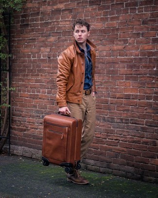 Brown Suitcase Outfits For Men: Putting together a brown leather shirt jacket with a brown suitcase is a savvy option for a casually cool look. To bring a bit of zing to your ensemble, introduce dark brown leather casual boots to this ensemble.
