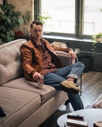 Tobacco Leather Shirt Jacket Outfits For Men: Go for a straightforward but at the same time casually dapper outfit teaming a tobacco leather shirt jacket and blue jeans. If you're on the fence about how to finish off, introduce a pair of tan suede desert boots to the equation.
