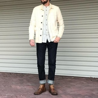 Dark Brown Leather Desert Boots Outfits: This combination of a beige shirt jacket and black jeans is indisputable proof that a pared down off-duty ensemble doesn't have to be boring. If you're not sure how to finish, a pair of dark brown leather desert boots is a never-failing option.