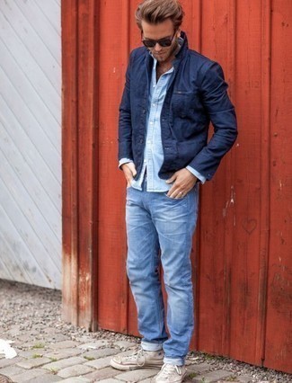 Navy Shirt Jacket Outfits For Men: Opt for a navy shirt jacket and light blue jeans to feel infinitely confident and look casually stylish. A good pair of beige canvas high top sneakers is a simple way to add a confident kick to the look.