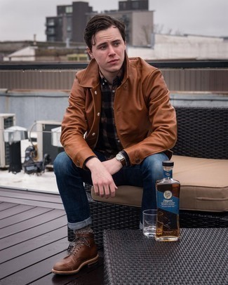 Tobacco Leather Shirt Jacket Outfits For Men: Reach for a tobacco leather shirt jacket and navy jeans for both dapper and easy-to-style ensemble. When it comes to footwear, this getup is completed nicely with brown leather casual boots.