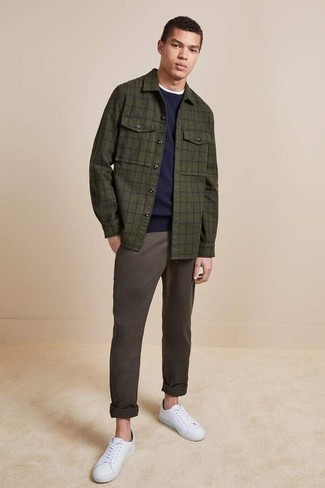 Dark Green Check Shirt Jacket Outfits For Men: This combination of a dark green check shirt jacket and charcoal chinos is an excellent option for off duty. Let your sartorial skills truly shine by rounding off your getup with white canvas low top sneakers.