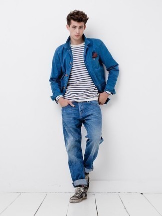 Blue Shirt Jacket Outfits For Men: For something more on the off-duty end, wear this combo of a blue shirt jacket and blue jeans. Amp up the wow factor of this ensemble with black and white canvas high top sneakers.