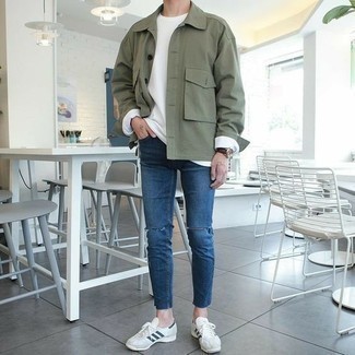 Navy Ripped Skinny Jeans Outfits For Men: An olive shirt jacket and navy ripped skinny jeans are the kind of a winning casual ensemble that you so awfully need when you have zero time. Go the extra mile and change up your outfit by rocking white and navy canvas low top sneakers.