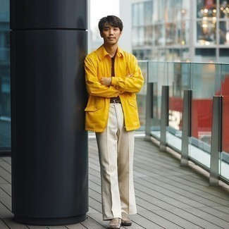 Yellow Shirt Jacket Outfits For Men: Choose a yellow shirt jacket and beige chinos for a proper refined outfit. In the footwear department, go for something on the smarter end of the spectrum by rounding off with beige canvas loafers.