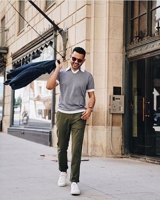Grey Polo Outfits For Men: For a relaxed menswear style with a twist, you can rock a grey polo and olive chinos. For maximum style, add a pair of white canvas low top sneakers to the equation.