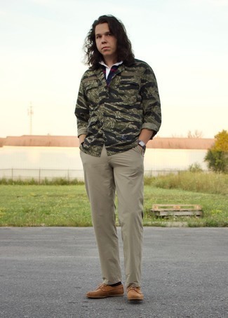 Olive Camouflage Shirt Jacket Outfits For Men: This look with an olive camouflage shirt jacket and khaki chinos isn't a hard one to put together and is open to more sartorial experimentation. A cool pair of brown suede boat shoes ties this getup together.