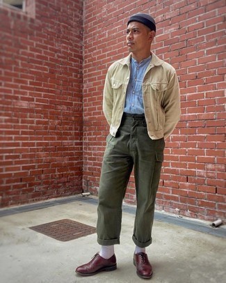 Beige Shirt Jacket Outfits For Men: Marry a beige shirt jacket with olive cargo pants for comfort dressing with a modernized spin. Tap into some Ryan Gosling dapperness and complete your ensemble with a pair of burgundy leather oxford shoes.