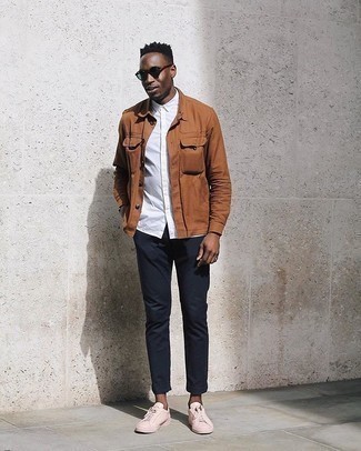 Tobacco Shirt Jacket Outfits For Men: Such items as a tobacco shirt jacket and navy chinos are an easy way to infuse some sophistication into your day-to-day off-duty repertoire. Pink canvas low top sneakers will bring a little edge to an otherwise mostly dressed-up getup.