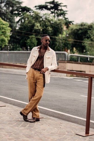 Brown Short Sleeve Shirt Outfits For Men: This combo of a brown short sleeve shirt and tobacco dress pants is a must-try effortlessly neat look for any modern gentleman. Rounding off with a pair of brown leather derby shoes is a simple way to bring some extra depth to your ensemble.