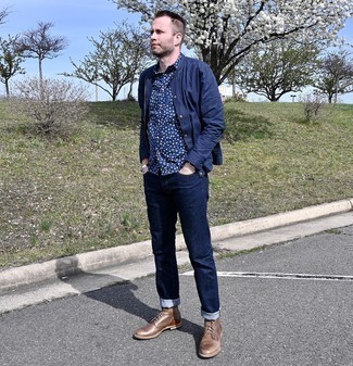 Navy and White Floral Short Sleeve Shirt Outfits For Men: A navy and white floral short sleeve shirt and navy jeans worn together are the perfect combo for gentlemen who prefer casually stylish styles. Hesitant about how to finish your outfit? Rock brown leather casual boots to class it up.