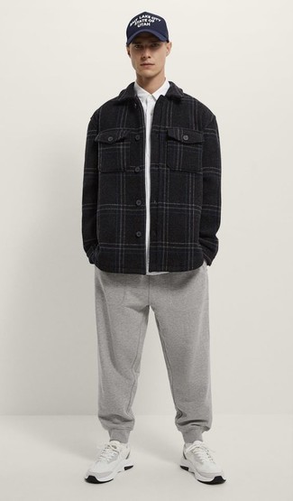 Black and White Plaid Wool Shirt Jacket Outfits For Men: This pairing of a black and white plaid wool shirt jacket and grey sweatpants is a safe and very fashionable bet. Wondering how to round off? Introduce a pair of white athletic shoes to the equation to shake things up.