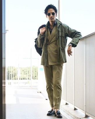 Olive Suit Outfits: An olive suit and an olive shirt jacket are strong players in any modern gent's closet. Let your sartorial credentials truly shine by completing this look with black leather tassel loafers.