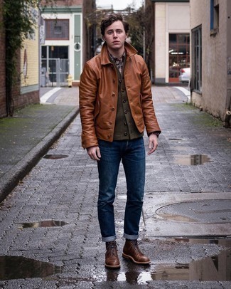 Tobacco Leather Shirt Jacket Outfits For Men: A tobacco leather shirt jacket and navy jeans combined together are a match made in heaven for those who prefer cool and relaxed outfits. This look is completed wonderfully with brown leather casual boots.