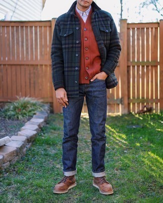 Sweater Vest Outfits For Men: Wear a sweater vest and navy jeans and get ready to be treated like a connoisseur of modern men's fashion. A pair of brown leather casual boots is a great choice to complete your outfit.